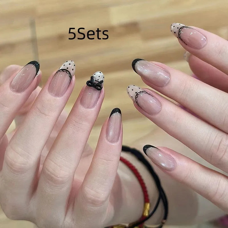 Five sets of sweet girl style press-on fake nails in a random colour assortment