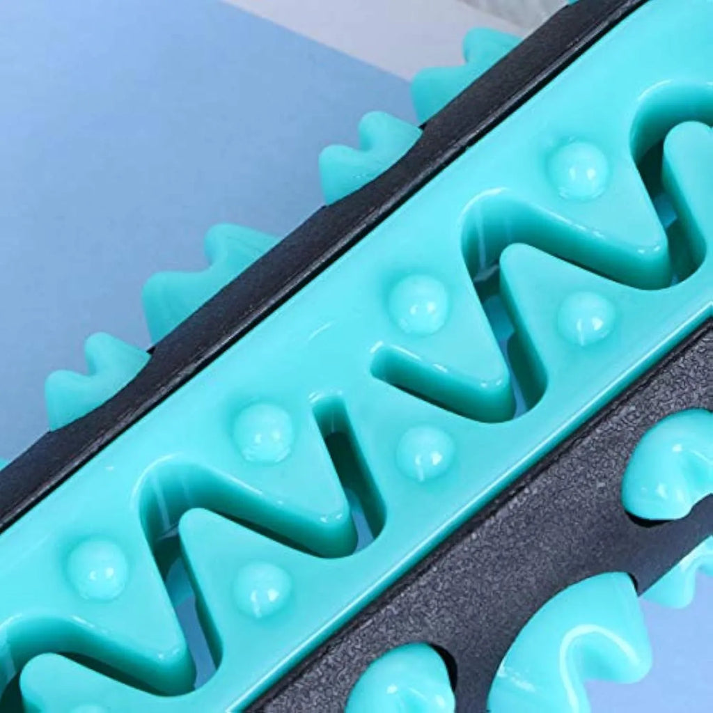 A natural rubber dog toothbrush chew toy in blue colour, showing its textured surface and stick shape.