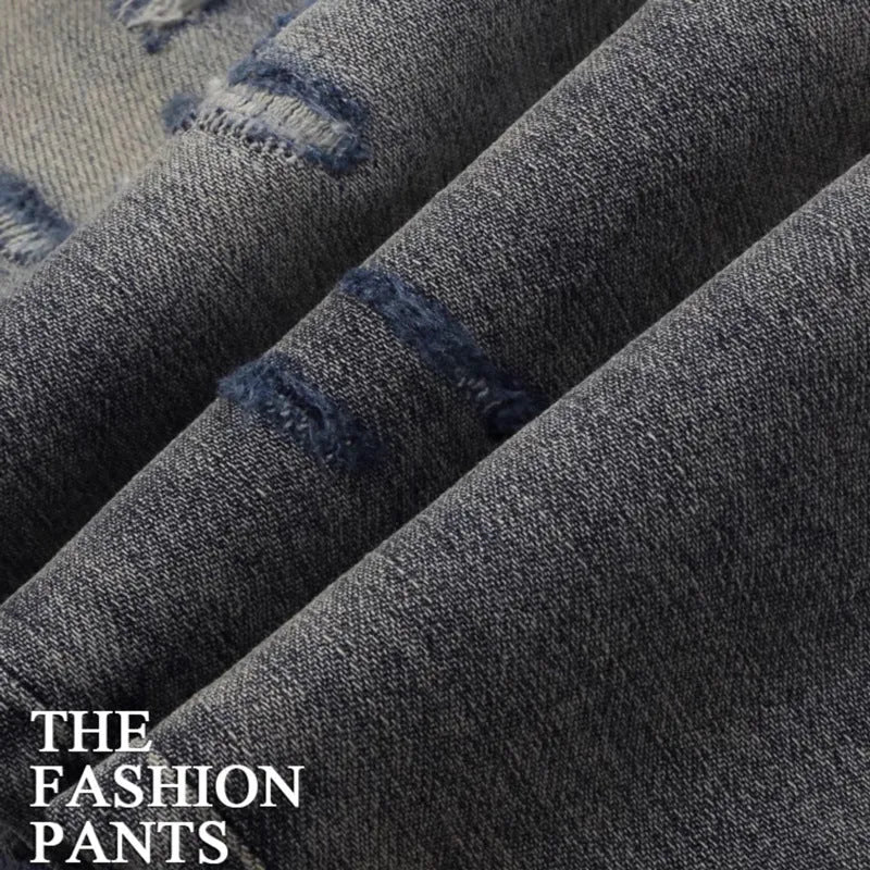 Men's slim fit jeans with distressed patches in washed-out old colour, showing front and back views