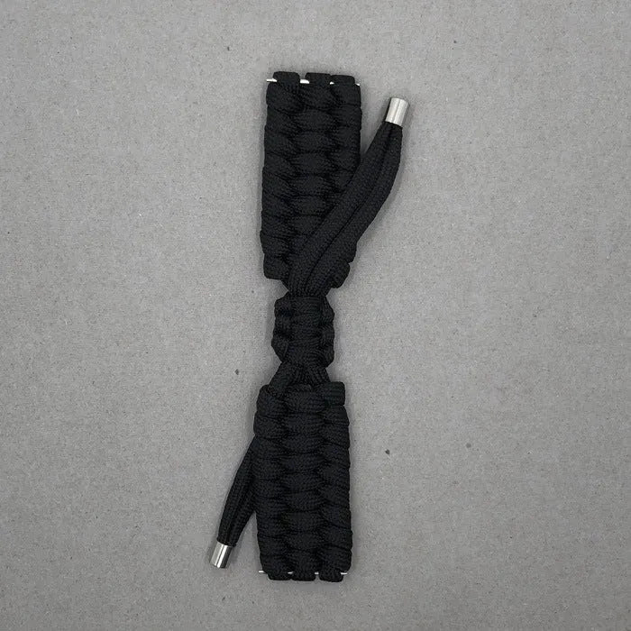 Braided paracord smart watch strap in black, shown detached from a watch, with standard connector lugs.
