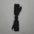 Braided paracord smart watch strap in black, shown detached from a watch, with standard connector lugs.
