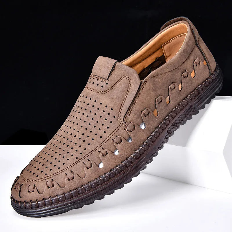 Men's brown slip-on casual shoes with round toe cap and hollowed-out sewing line detailing
