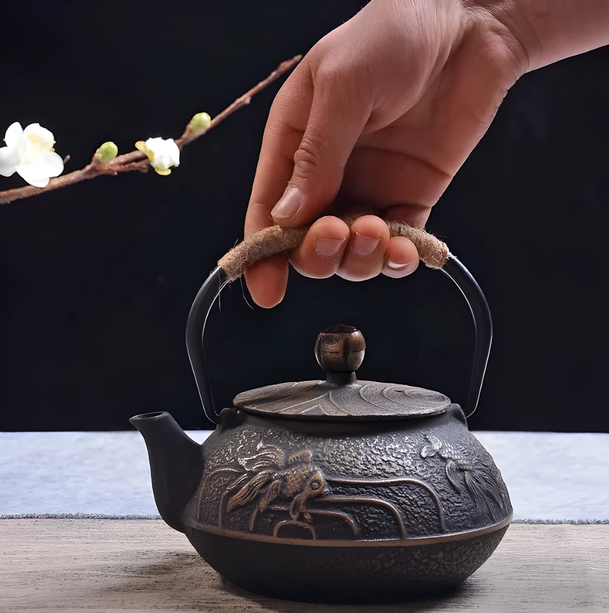 Japanese-style cast iron teapot in a choice of ten patterns, shown in 0.9L size.