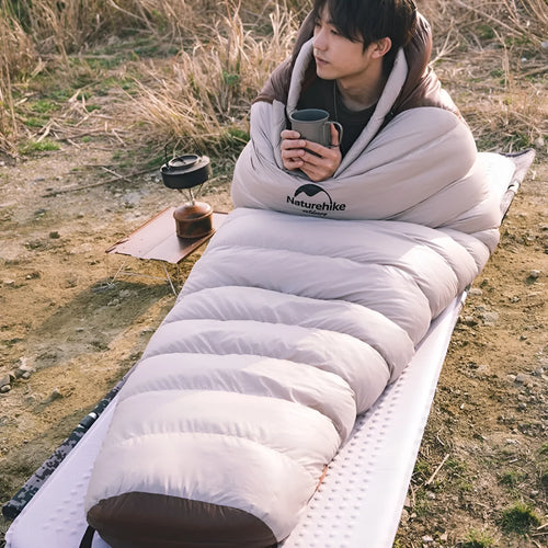 Adult mummy-style sleeping bag with goose down filler in multiple colour and weight options.