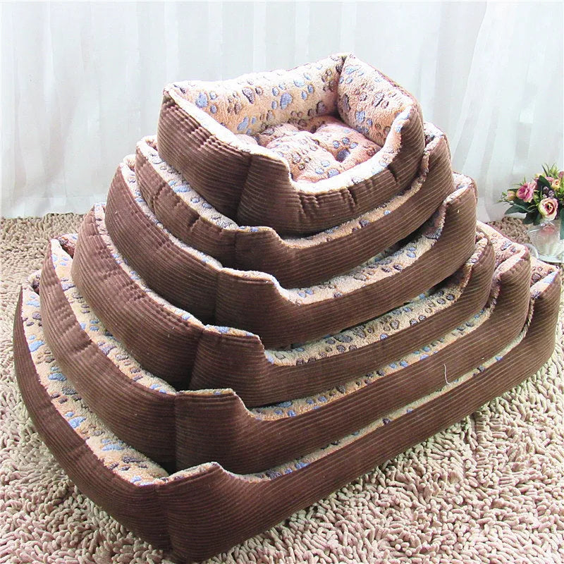 Orthopaedic foam dog bed with plush cover in beige, showing sofa-style raised edges and available in six sizes