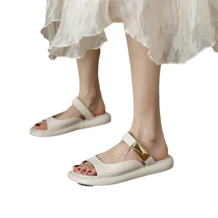Women's apricot soft leather peep toe flat platform sandals with rubber sole on a white background.
