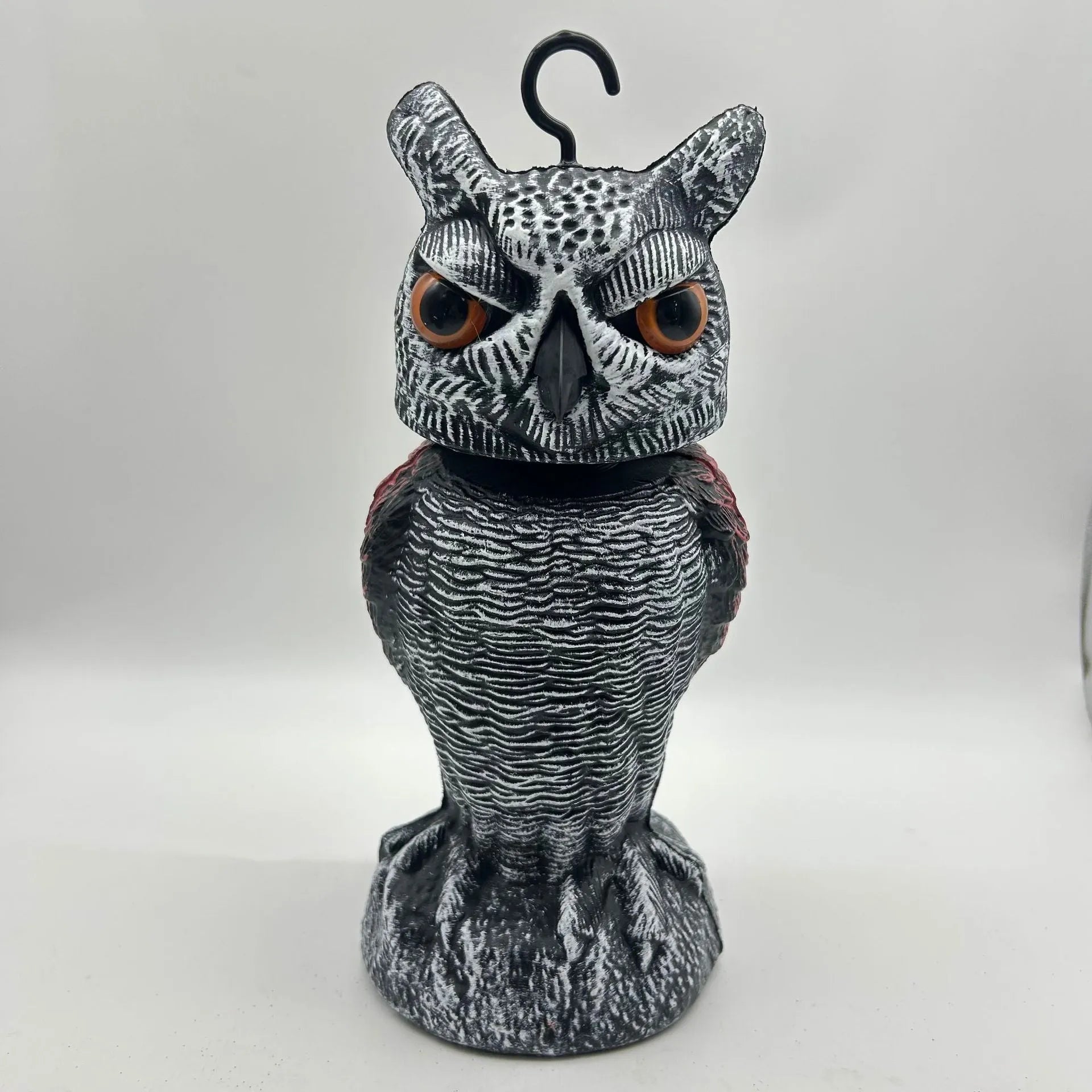 Artificial owl bird deterrent decoy with realistic features for outdoor garden use