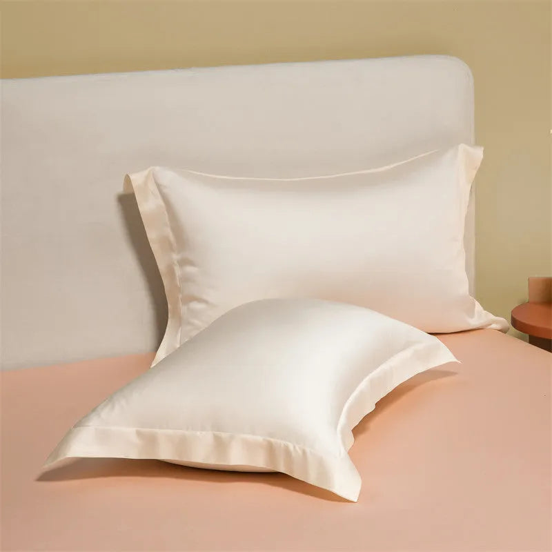 Lenzing Tencel 200 thread count bedding set in satin weave showing Aurora Blue quilt cover and pillowcases