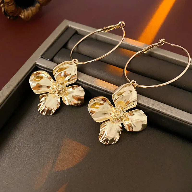 Silver needle flower geometric earrings in gold and silver colour options with vintage styling