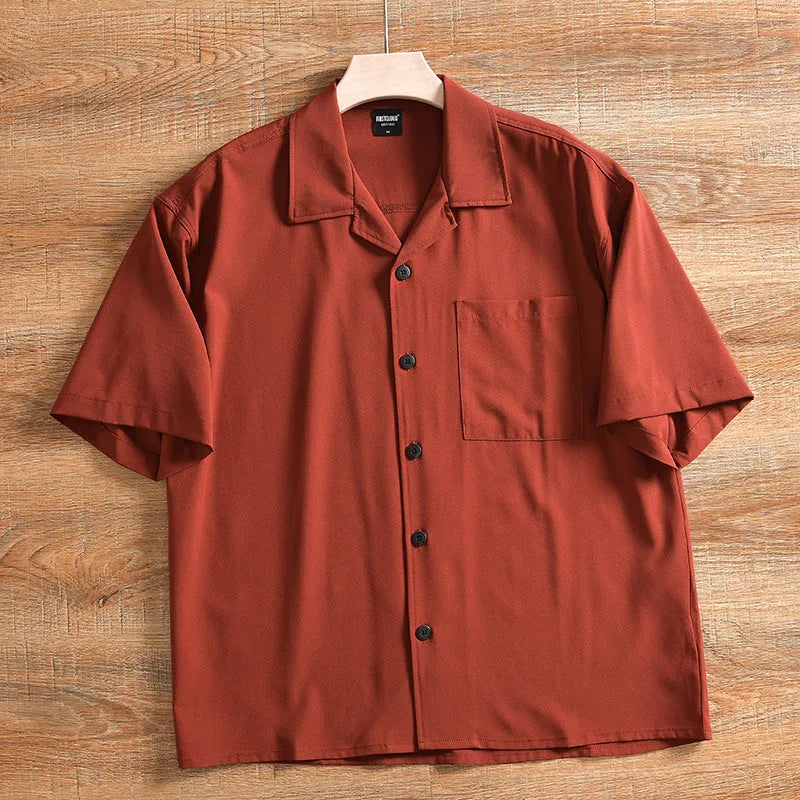Men's loose-fit lightweight short sleeve shirt in solid colour, shown in Army Green.