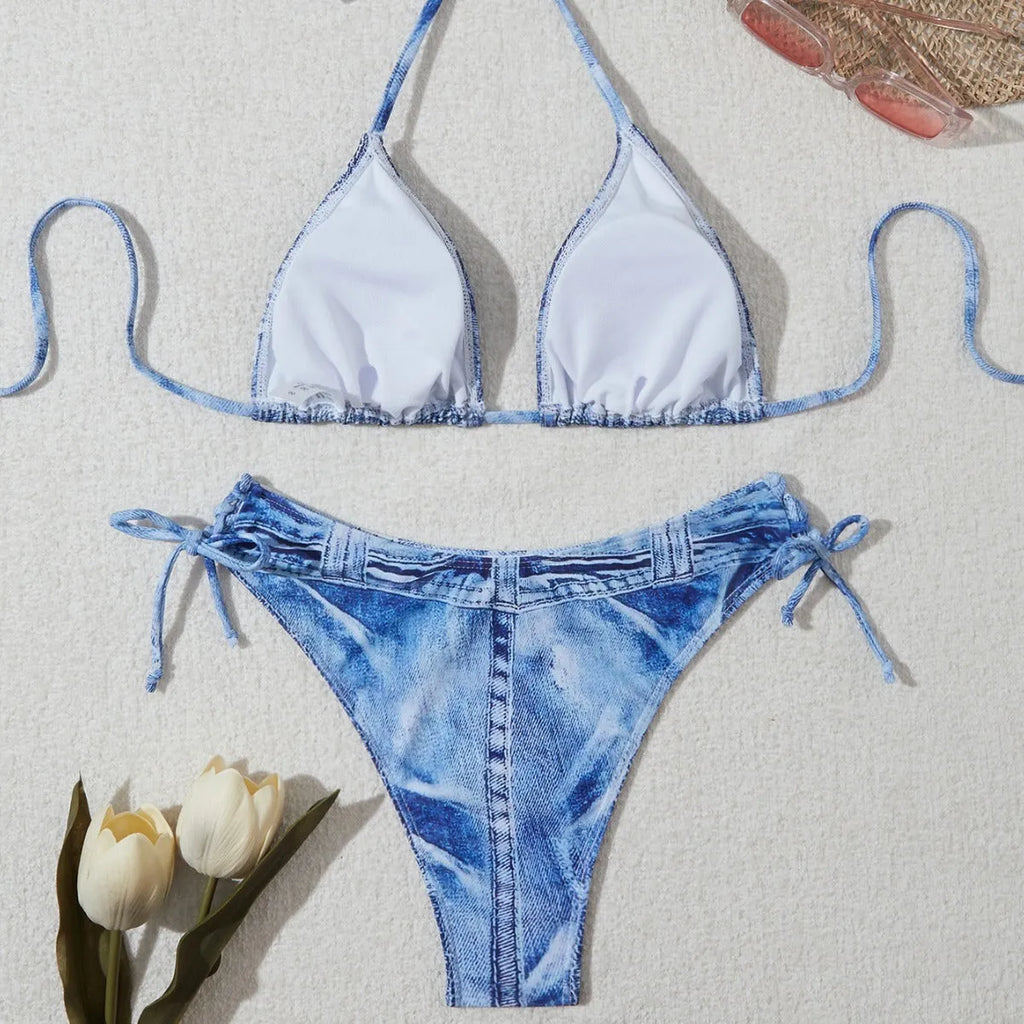 Women's denim blue printed bikini set with adjustable straps on mannequin