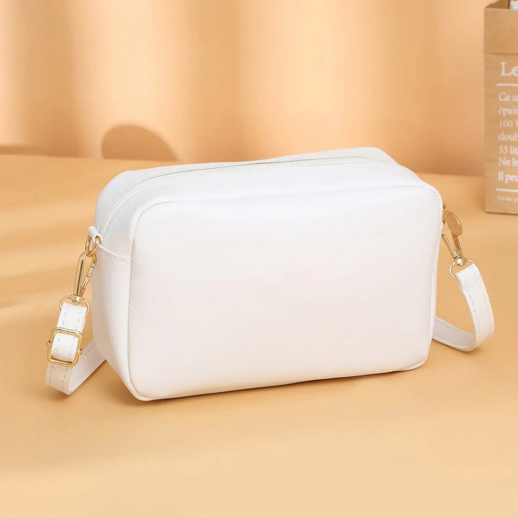Women's solid colour PU shoulder bag in a horizontal square shape with a three-dimensional pocket.