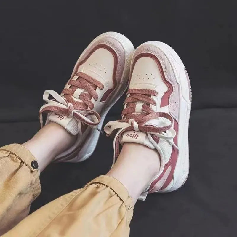 Spring rubber sneaker low top in pink and milky white colours with height increasing function