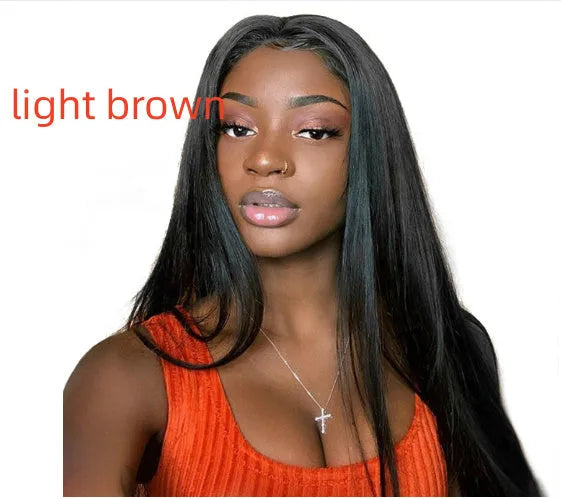 Long straight synthetic wig with centre-parted bangs in black colour on display