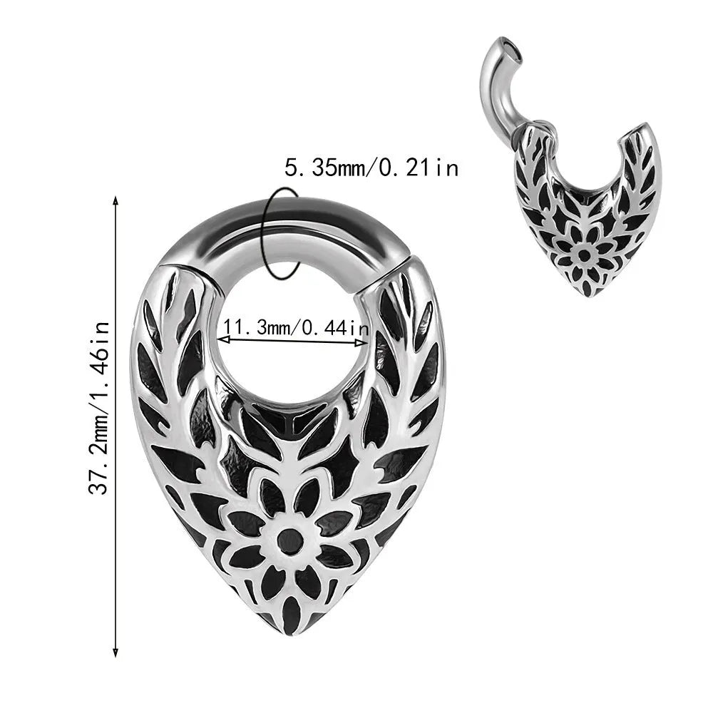 Stainless steel drop-shaped auricle earlobe extender earring with round hanging egg design and totem detail.
