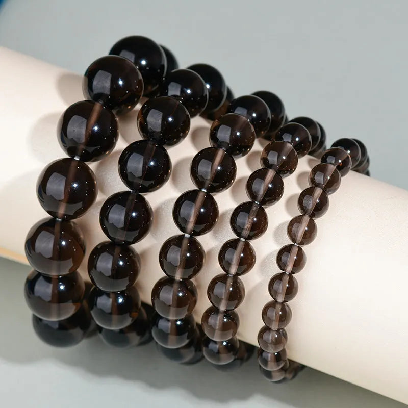 Hand-woven obsidian couple bracelet set with year of birth engraving in ethnic unisex style