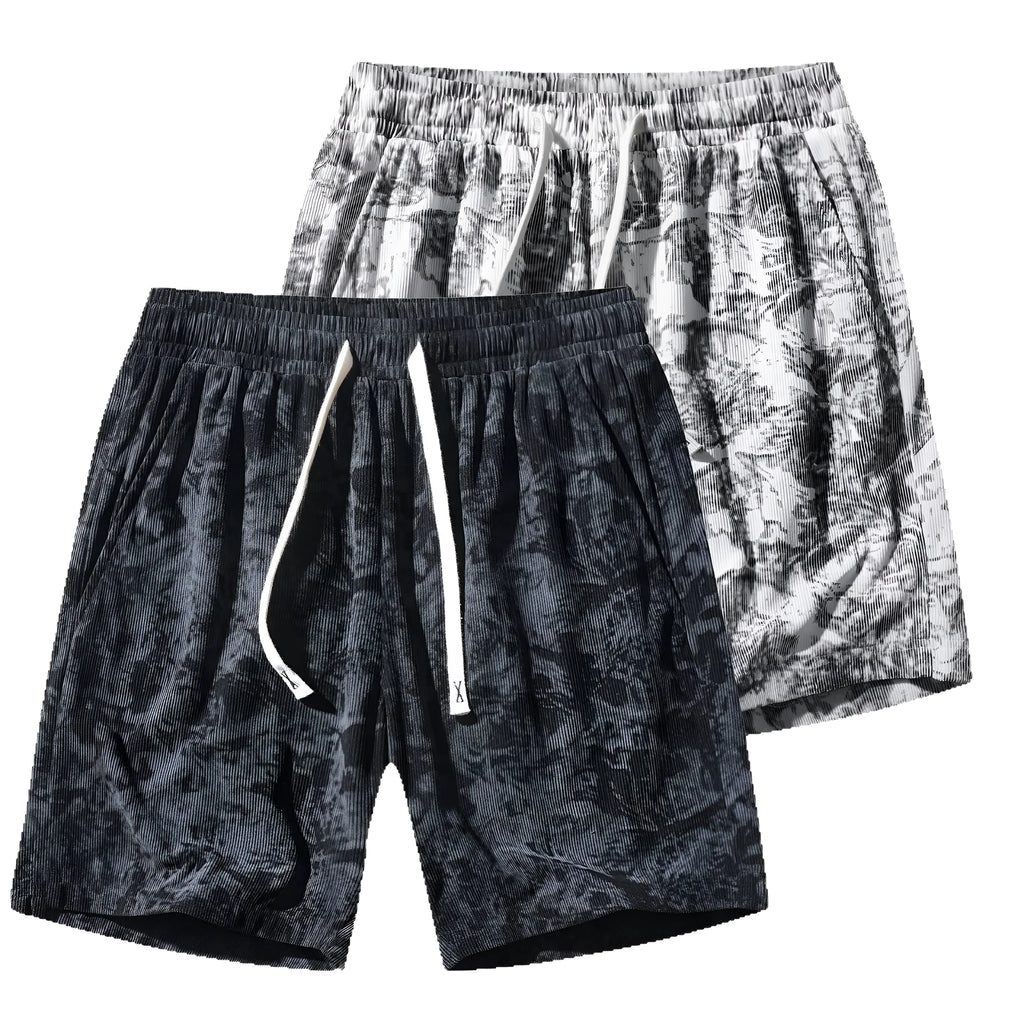 Men's straight-leg corduroy camouflage shorts in black, shown on a model.