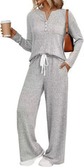 Women's striped knit V-neck long coat in light grey with matching pants, showing lace-up details