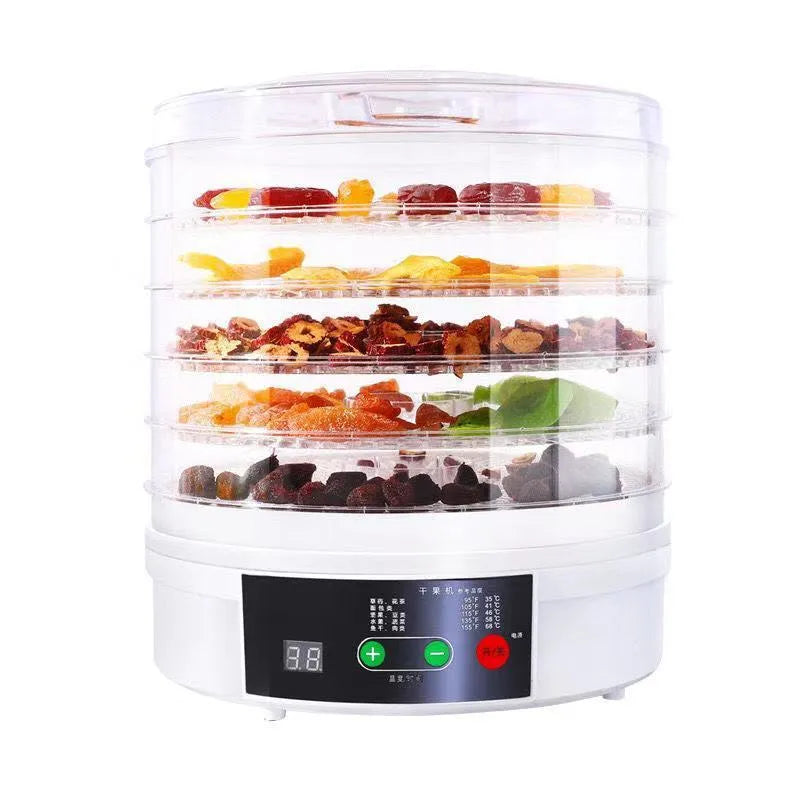 White five-tray food dehydrator with UK plug on kitchen countertop