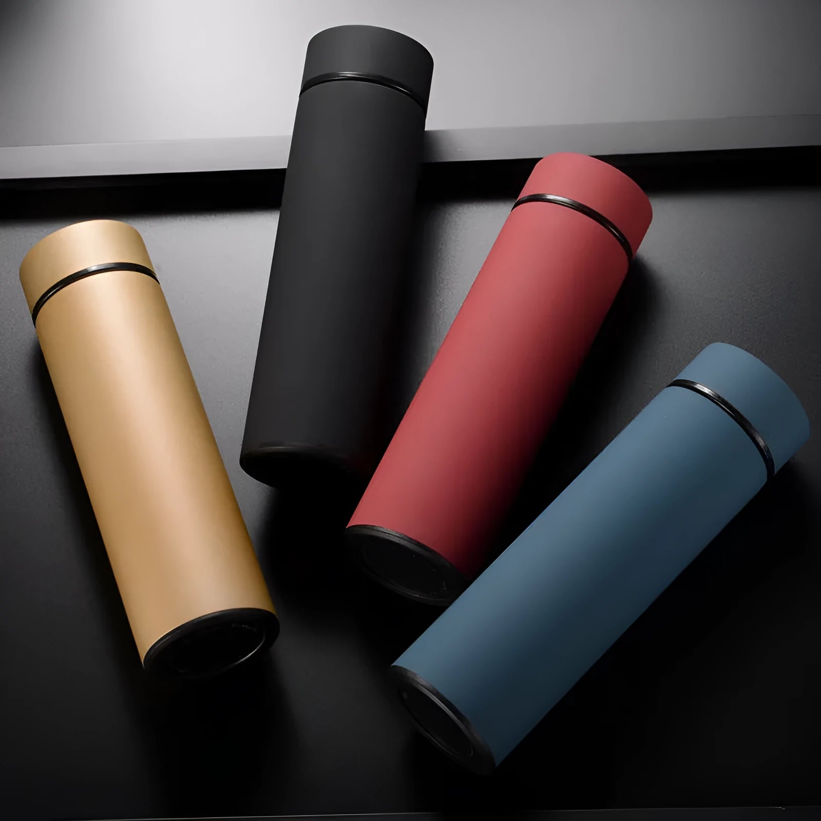 450ml stainless steel vacuum-insulated water bottle in black, red, gold, blue, and colour-changing temperature-sensitive versions.