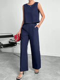 Women's red sleeveless top and wide-leg trousers two-piece set showing front view