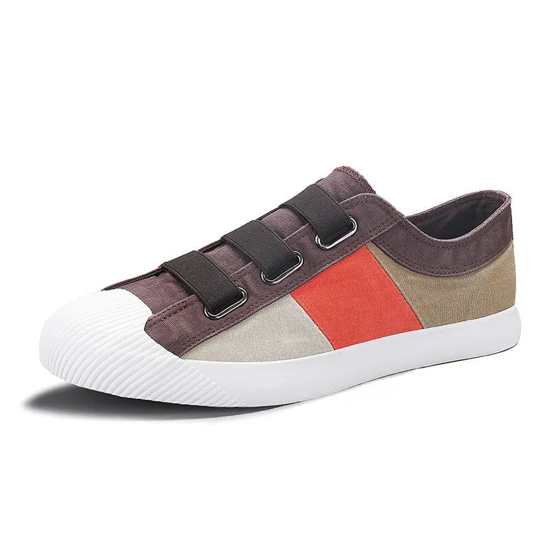 Men's canvas sneakers in multiple colours with elastic band closure and vulcanised rubber soles