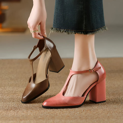 Retro pointed-toe women's Mary Jane shoes with a hollow design and buckle strap in pink or dark brown.