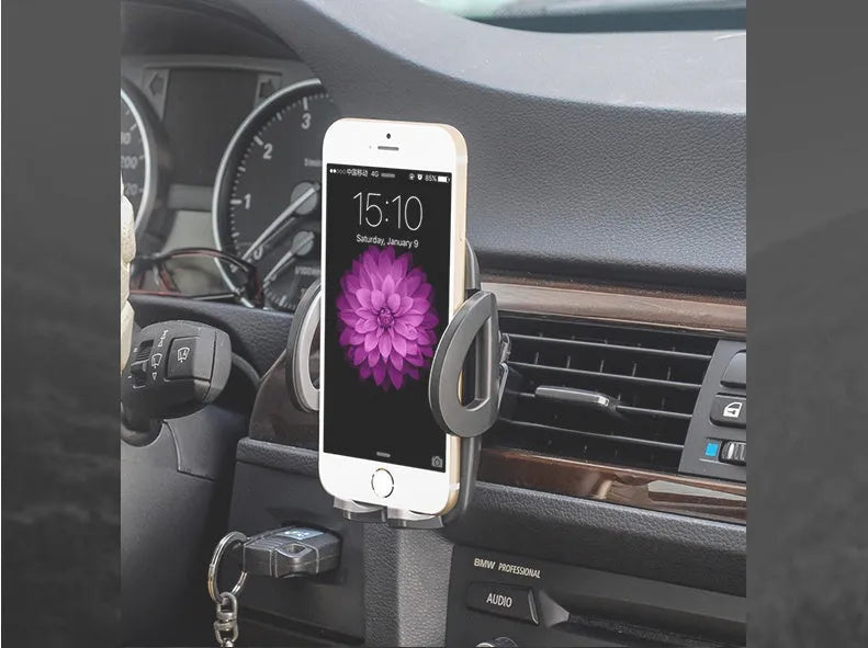 Black plastic car vent mobile phone holder with adjustable arms for universal device compatibility