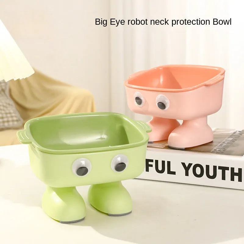 Green robot-shaped elevated cat bowl with tilted design and detachable inner component