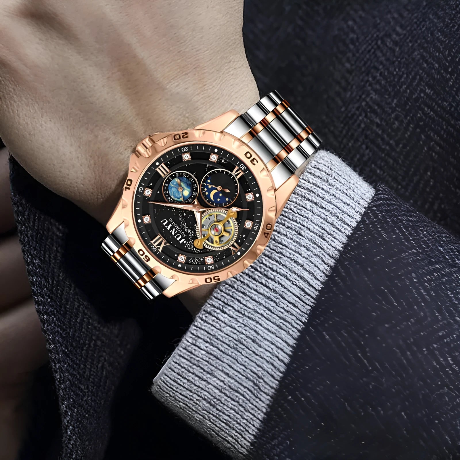 Men's automatic mechanical watch with luminous hands on a black starry sky dial and rose gold case