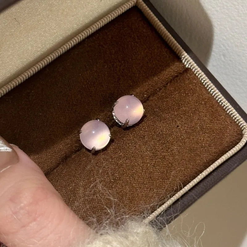 Chinese style chalcedony earrings with four claw copper setting and round egg surface stone