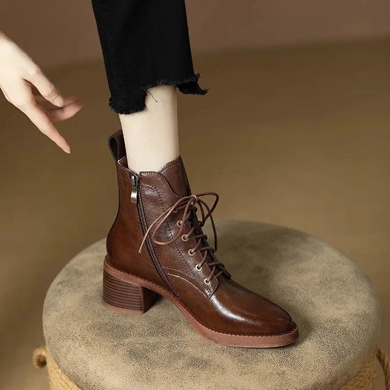 Women's black pointed-toe ankle boots with 5.5cm heel and 13cm shaft