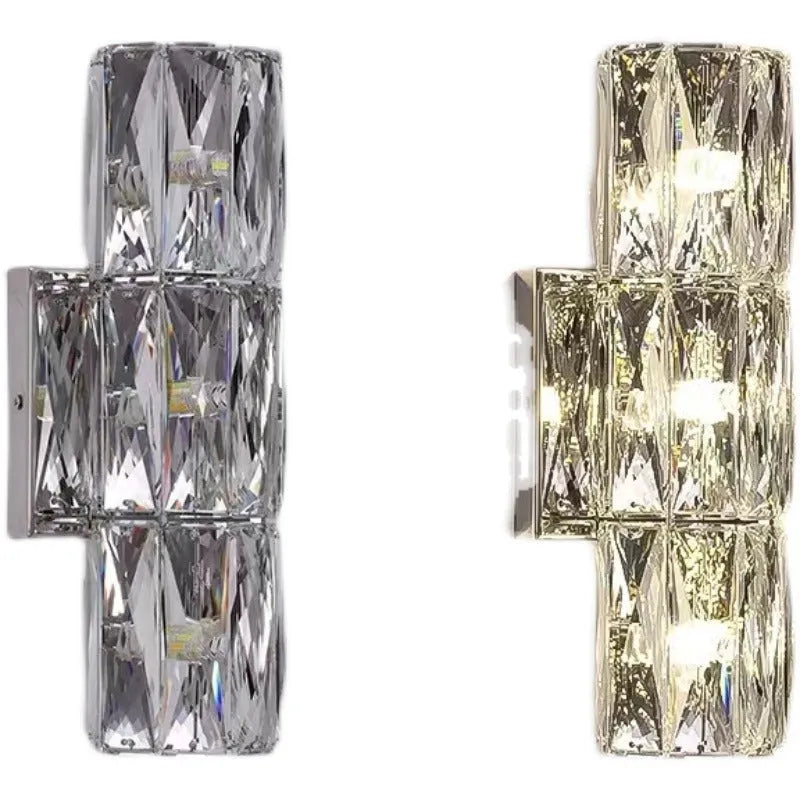 Crystal wall lamp with stainless steel frame in gold or chrome finish, mounted on a wall.