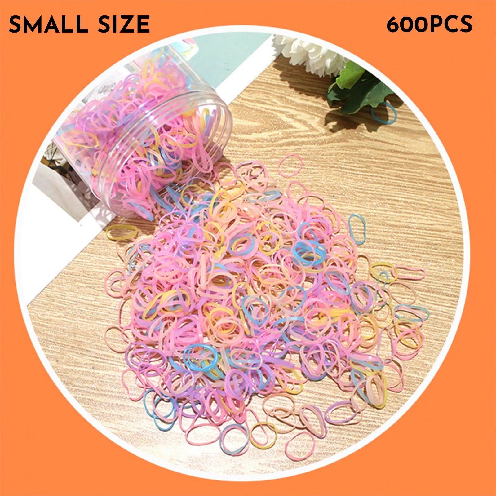 Assortment of colourful thin TPU baby hair ties in a clear reusable plastic container.