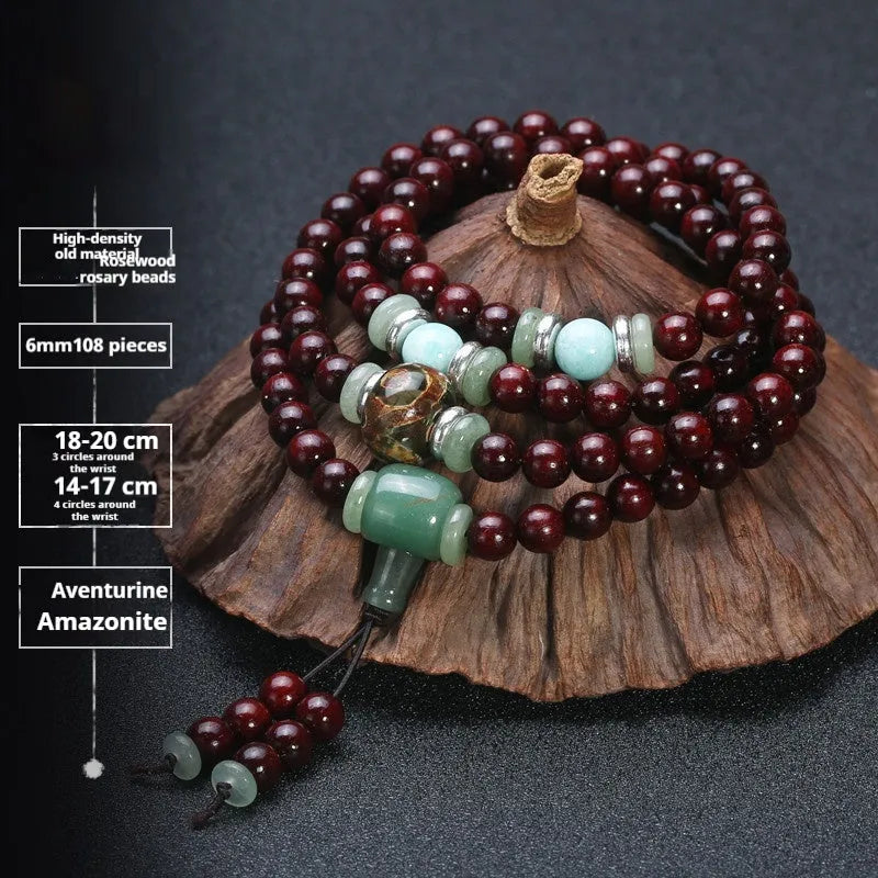 Men's rosewood 108 bead mala bracelet with a turquoise gemstone decorative centrepiece.
