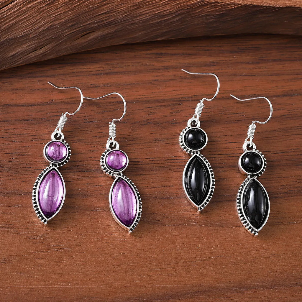 Black and purple geometric pendant earrings with round elements in vintage bohemian style
