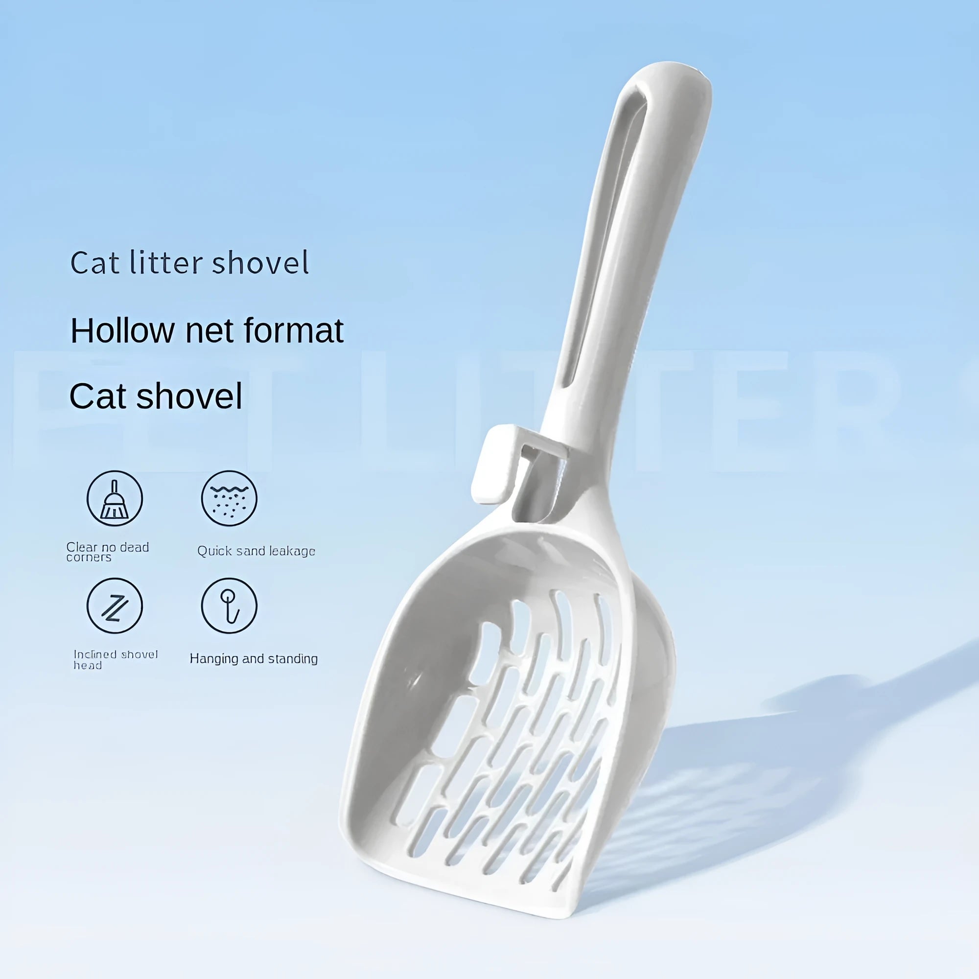 Grey plastic cat litter scoop with handle sitting upright in its integrated square base.