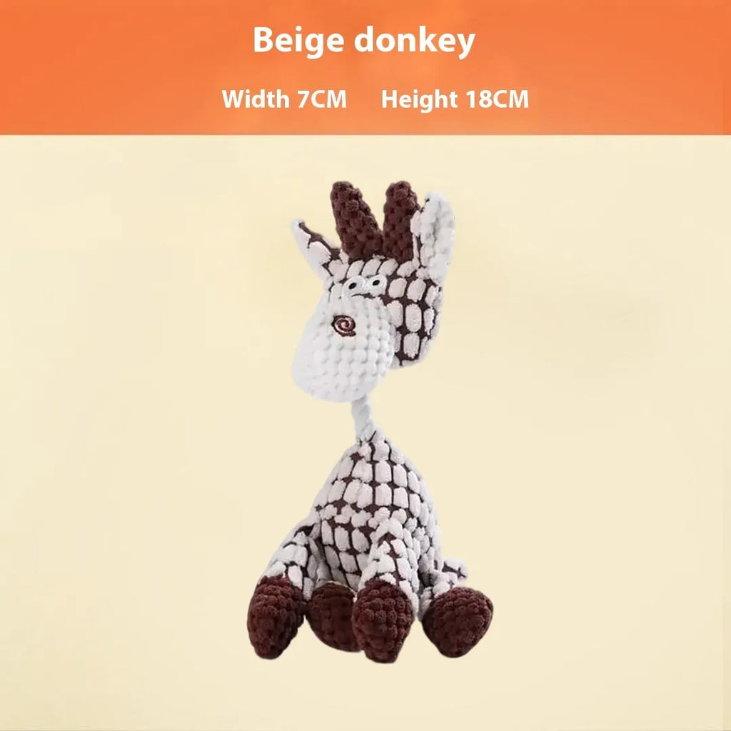 Assorted plush pet chew toys including a blue elephant, a duck, and a donkey in different colours