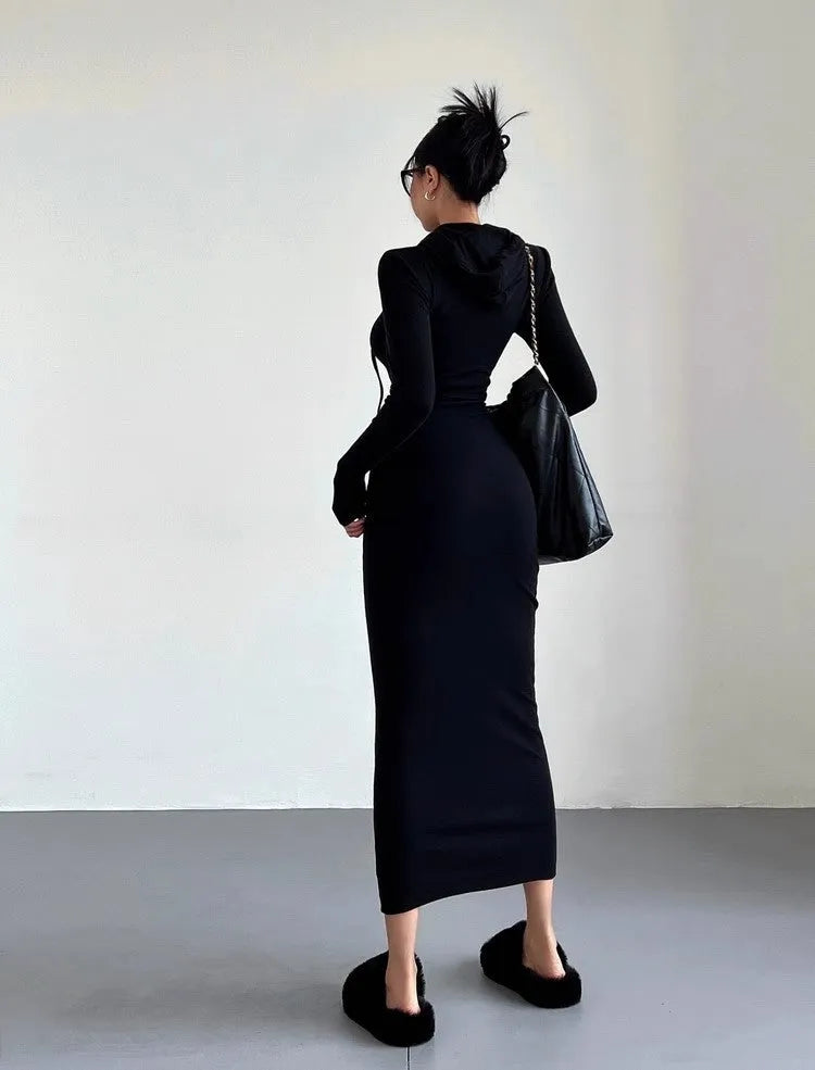 Women's grey hooded long sleeve sheath dress with high waist on a mannequin.