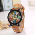 Women's vintage style quartz watch with brown leather strap and 37mm round silver dial