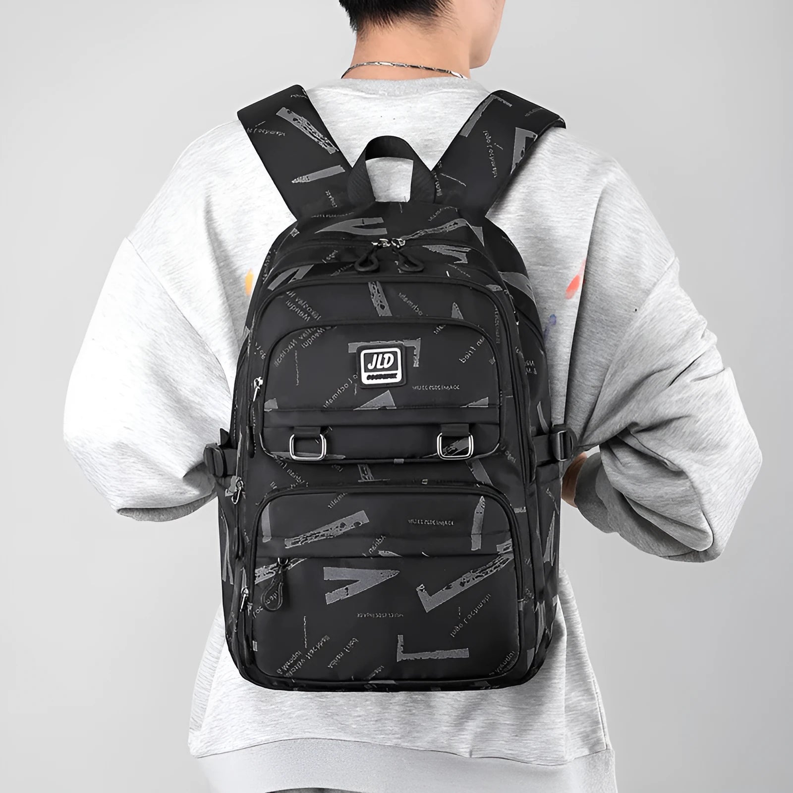 Large capacity girls' school backpack in nylon, showing colour options and physiological back support design.