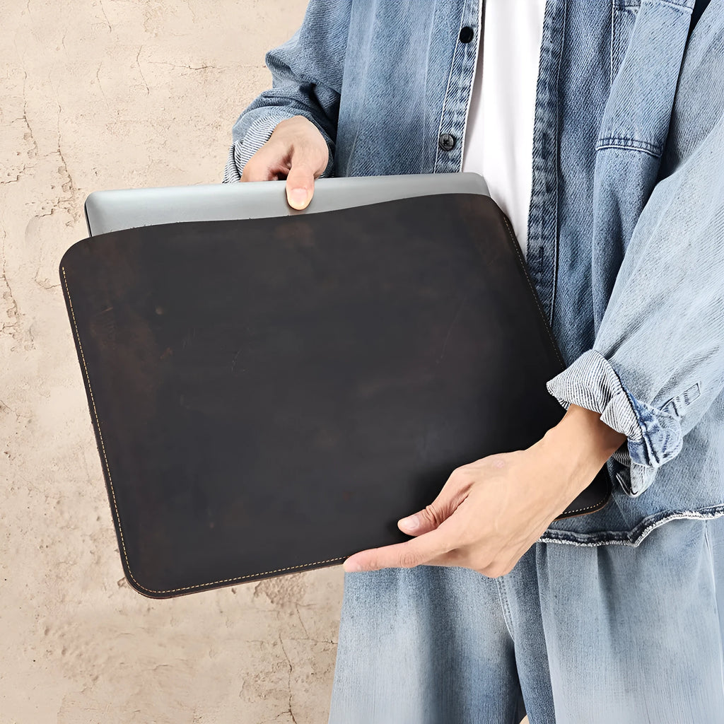 Brown genuine cowhide horizontal computer liner bag showing laptop compartment