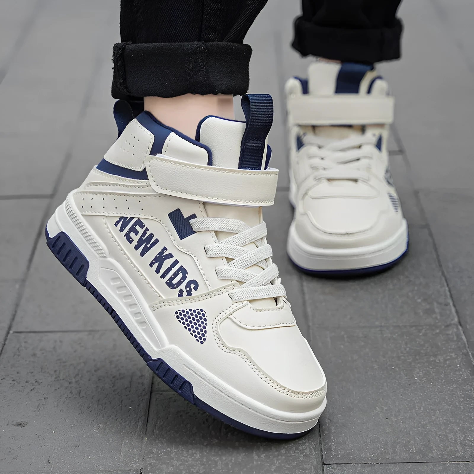 Children's street sneakers with letter pattern PU upper and rubber sole showing buckle closure