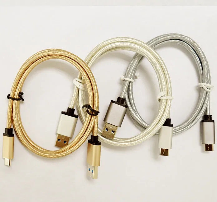 USB Type-C charging cable with metal casing and gold connectors in silver colour