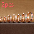 Circle perforated zircon stud earrings in gold, rose gold, and silver colour with geometric design