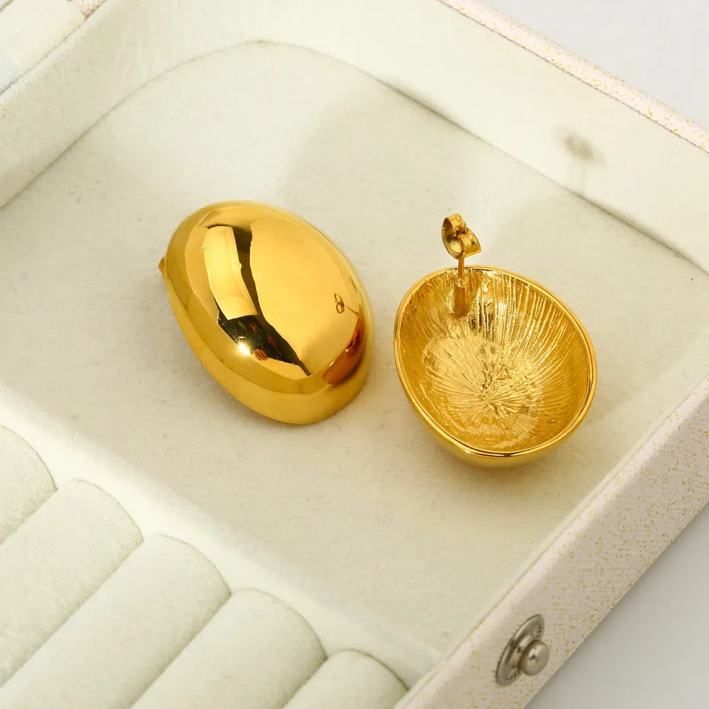 Geometric stainless steel ear studs with glazed 18K gold electroplated surface in DFE139 colour