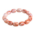 Natural cherry agate bracelet with barrel-shaped beads and ruyi design elements