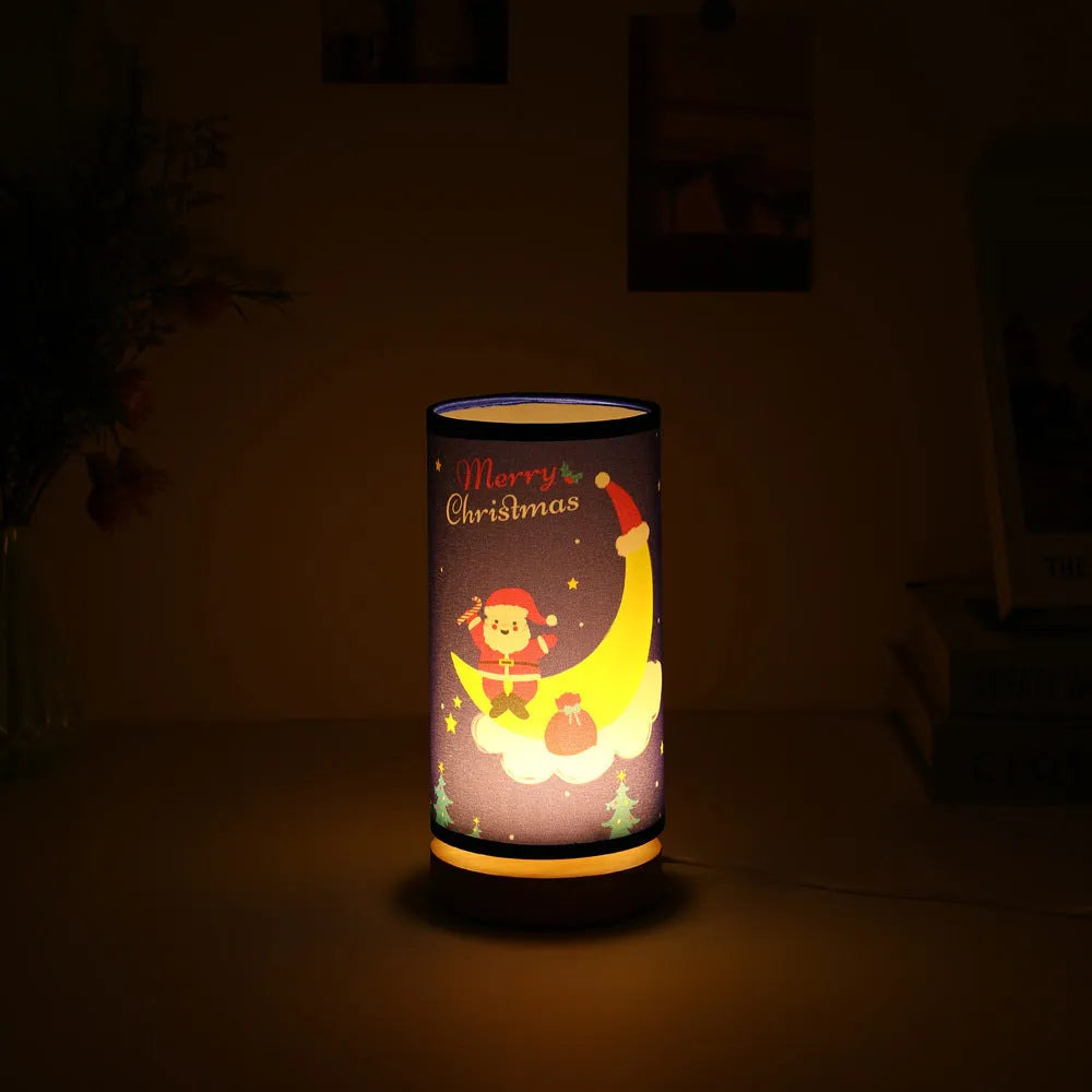 Moon Santa Claus themed LED night light with a bamboo base and a USB plug cable.