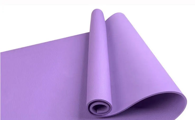 Red EVA yoga mat with textured anti-skid surface, shown rolled and unrolled.
