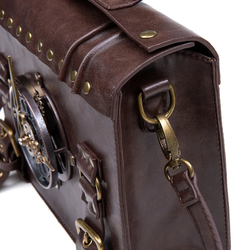 Bronze steampunk industrial retro style shoulder bag with metal details and pillow shape.